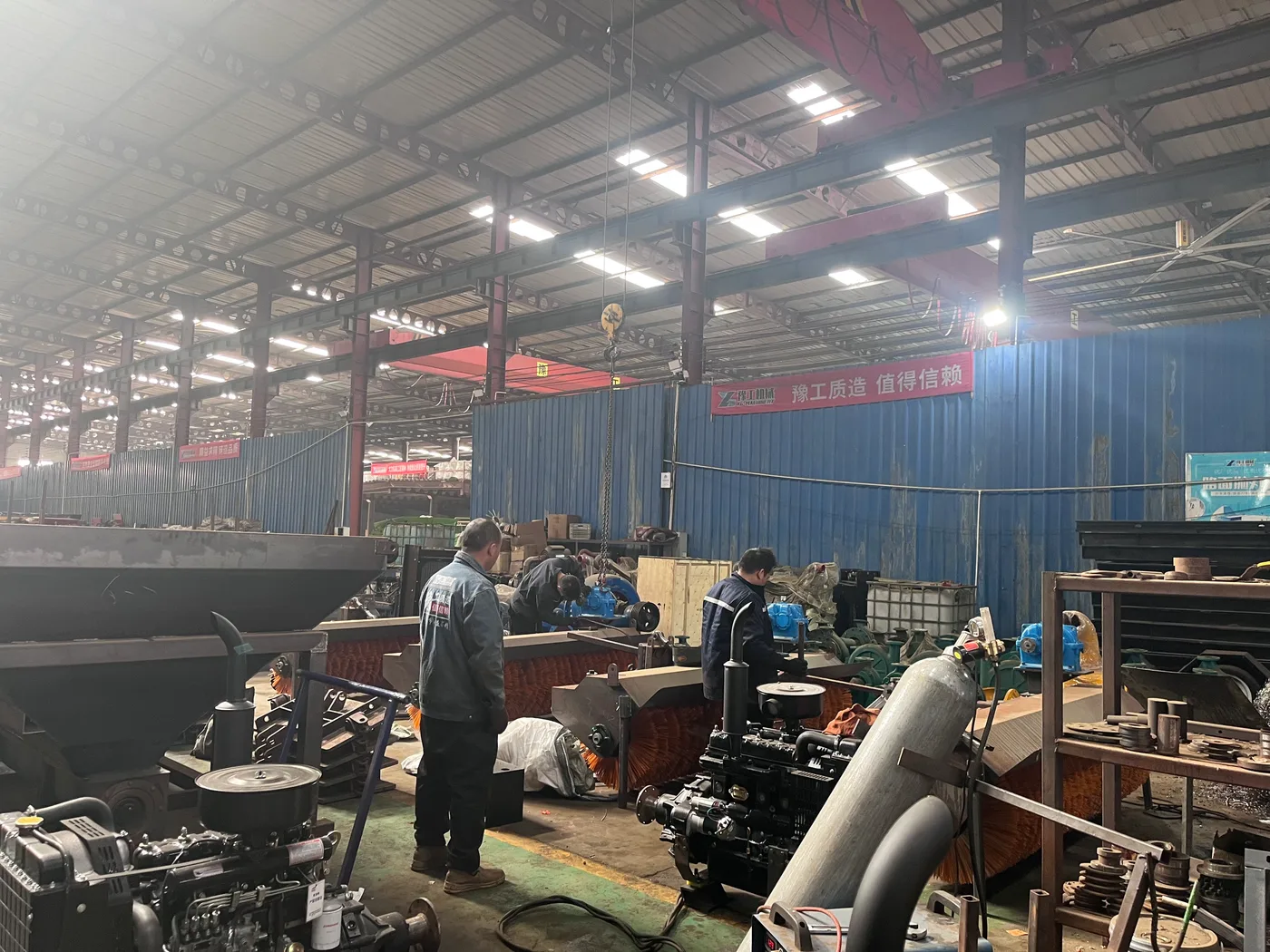 Workers and machinery in the production workshop